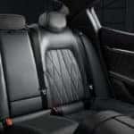 2019 Ghibli GranLusso black leather interior with view of rear seats